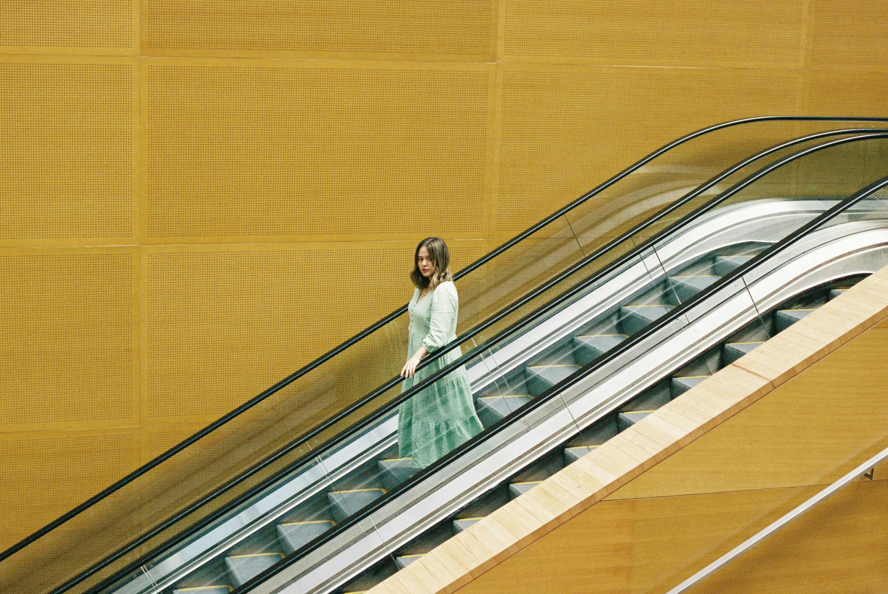 handrail housing staircase adult female person woman formal wear dress face